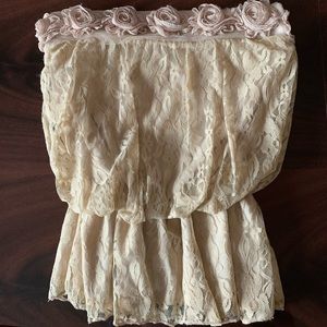 Lacey Creme-colored Strapless Top